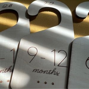 Beautiful handmade in wood closet dividers for baby.